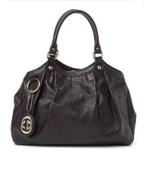 Gucci Black leather Sukey GG Embossed Shoulder Bag with Gold-Tone Charm